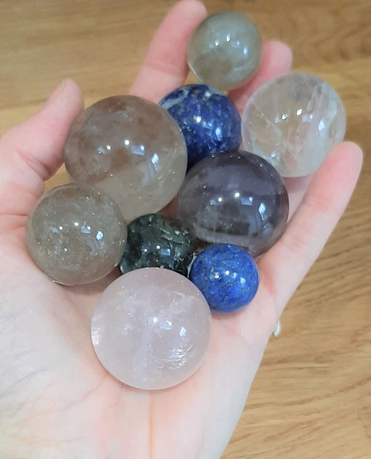 Gemstone spheres: quartz, lapis lazuli, amethyst balls