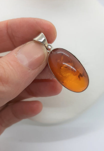 925 Sterling Silver Oval Pendant with genuine Amber