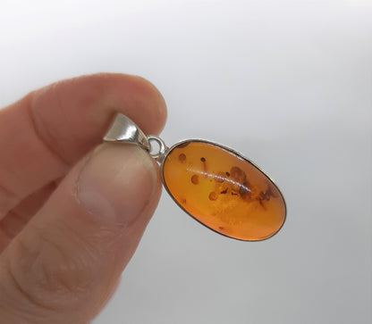 925 Sterling Silver Oval Pendant with genuine Amber